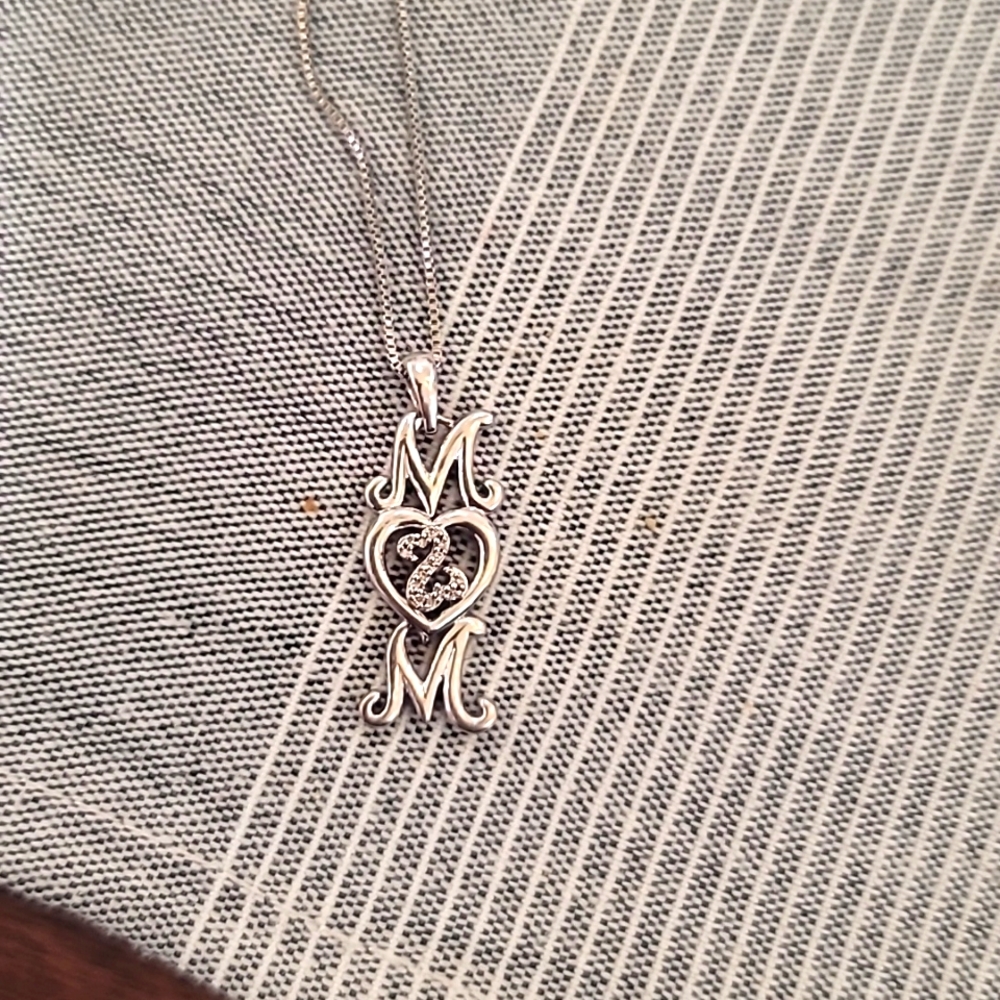 Kay's mom diamond heart necklace